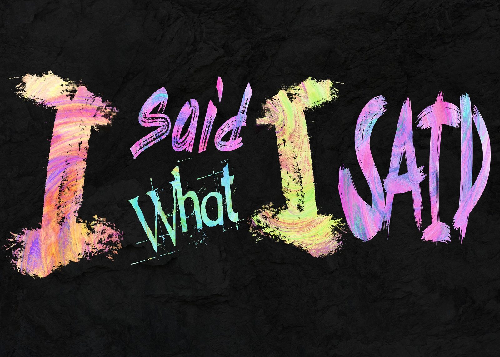 Title card for I Said What I Said, AJ Finnegan's ongoing art series, in pastel brushstroke lettering on black