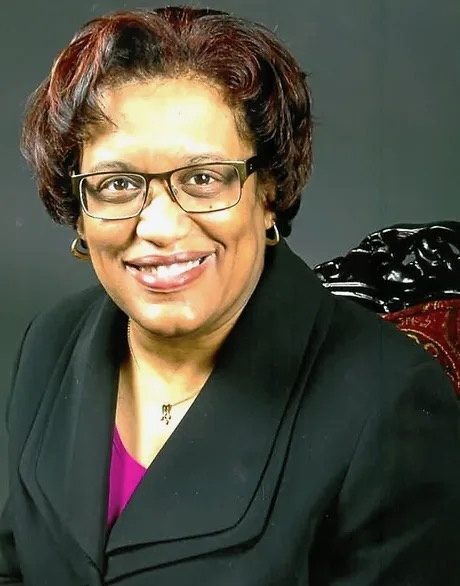 Pastor Anita Lovell of Mt. Olive Baptist Church in Canonsburg, Pennsylvania, smiling in a black jacket