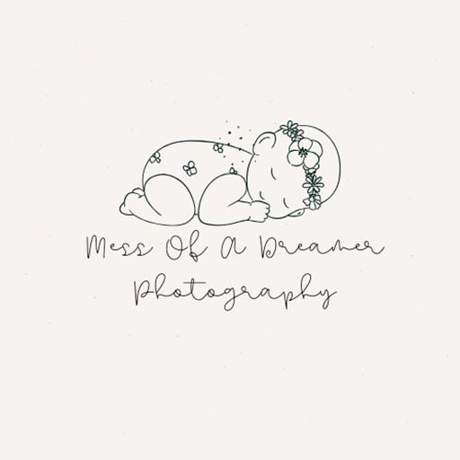 Mess Of A Dreamer Photography logo: a line drawing of a sleeping newborn in a flower crown above the name in script