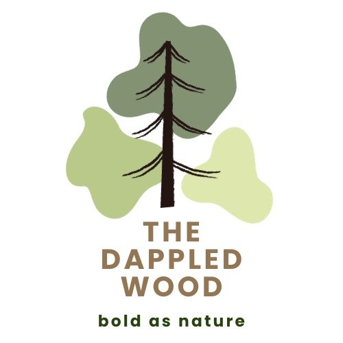 The Dappled Wood logo: a pine tree over green shapes with the tagline bold as nature