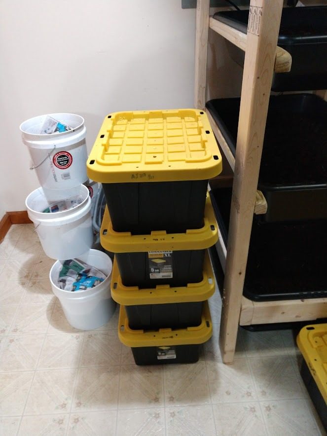 Stacked worm bins in Samantha Flowers's laundry room, where Meme's Worms began